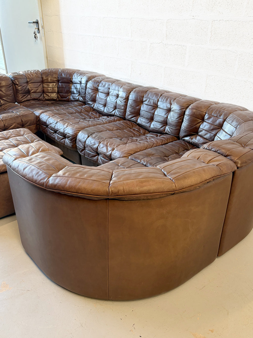 Canapé modulable De Sede DS11 en cuir patchwork chocolat