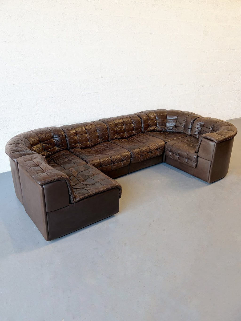 Canapé modulable De Sede DS11 en cuir patchwork chocolat