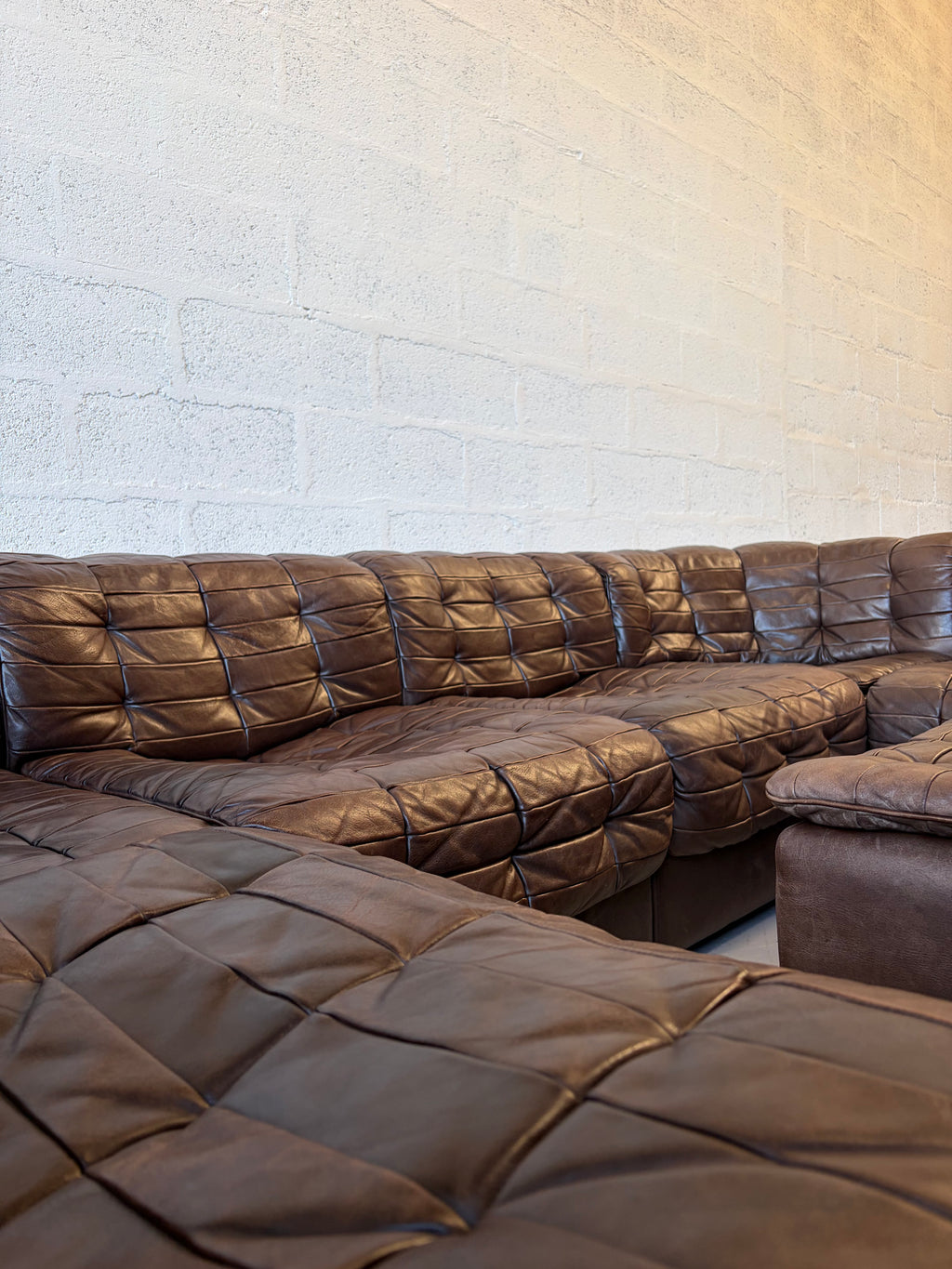 Canapé modulable De Sede DS11 en cuir patchwork chocolat